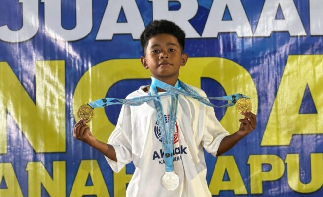 Perenang muda asal Merauke, Papua Selatan, Zaqwan (8), menorehkan prestasi membanggakan setelah dinobatkan sebagai Perenang Terbaik Kelompok Umur (KU) V Putra pada ajang Piala Pangdam XVII/Cenderawasih yang berlangsung di Kolam Renang Batalyon 751, Sentani.